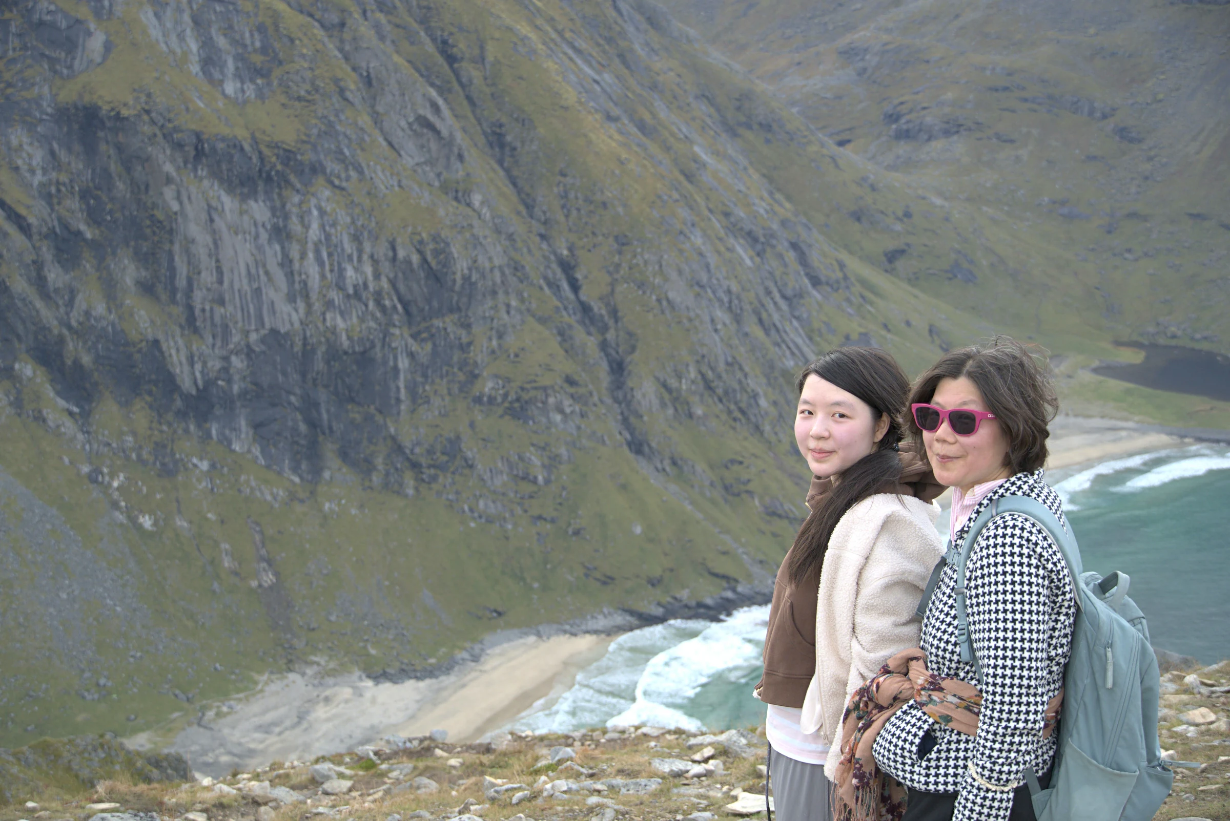 Two guests above Kvalvika Beach on the Ryten hike